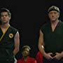 William Zabka and Xolo Maridueña in Cobra Kai (2018)