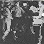 Leon Beaumon, Julie Bishop, William Desmond, Artie Ortego, William L. Thorne, and Tom Tyler in Clancy of the Mounted (1933)