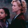 Charlize Theron and Erykah Badu in The Cider House Rules (1999)