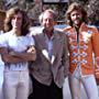 Barry Gibb, Maurice Gibb, Robin Gibb, and Robert Stigwood in Sgt. Pepper