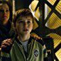 Parker Posey and Maxwell Jenkins in Lost in Space (2018)