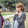 Director Sarah Phillips talks through the scene with actor Noah James.