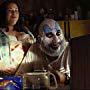 Sid Haig and Juanita Guzman in The Devil