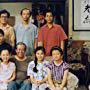 You Ge, Tian Liang, Dandan Song, Lixin Yang, Chang Shen, Ling Guan, Xingyu Wen, and Mingming Zhao in I Love My Family (1993)