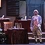 Peter Tedeschi, far left, as John Adams in 1776 as Adams confers with Dr. Lyman Hall.