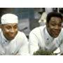 Roger Griffiths and Lenny Henry in Chef! (1993)