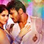 Sunny Leone and Manoj Kumar Manchu in Current Theega (2014)