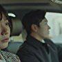 Doona Bae and Seung-woo Cho in Stranger (2017)