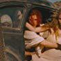 Riley Keough, Zoë Kravitz, and Rosie Huntington-Whiteley in Mad Max: Fury Road (2015)