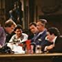 Woody Harrelson, John Ratzenberger, George Wendt, Tim Cunningham, Steve Giannelli, and Johnny Gilbert in Cheers (1982)