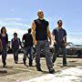 Vin Diesel, Sung Kang, Tyrese Gibson, Paul Walker, Tego Calderon, Don Omar, and Gal Gadot in Fast Five (2011)