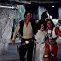 Harrison Ford, Carrie Fisher, Mark Hamill, and Peter Mayhew in Star Wars: Episode IV - A New Hope (1977)