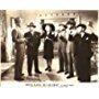 Lloyd Corrigan, Richard Lane, Chester Morris, George E. Stone, Forrest Tucker, and Constance Worth in Boston Blackie Goes Hollywood (1942)