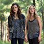 Phoebe Tonkin and Claire Holt in The Originals (2013)