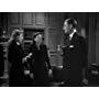 Errol Flynn, Barbara Stanwyck, and Geraldine Brooks in Cry Wolf (1947)