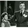 Cesar Romero and Stanley Clements in Tall, Dark and Handsome (1941)