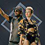 Miley Cyrus and Will.i.am in Will.I.Am Feat. Miley Cyrus, Wiz Khalifa, French Montana: Feelin