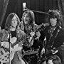 Eric Clapton, John Lennon, Mitch Mitchell, and Keith Richards in The Rolling Stones Rock and Roll Circus (1996)