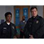 Nathan Fillion and Afton Williamson in The Rookie (2018)