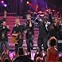 Bryan Adams, David Cook, David Hernandez, Chikezie Eze, David Archuleta, Michael Johns, and Jason Castro in American Idol (2002)