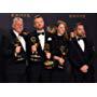 Charlie Brooker and the "Black Mirror" crew pose with the Emmy for Outstanding Writing for a Limited Series, Movie, or Dramatic Special during the 69th Emmy Awards