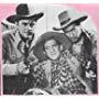 Russell Hayden, Rad Robinson, and Britt Wood in Knights of the Range (1940)