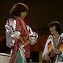 Mick Jagger, Bill Wyman, and The Rolling Stones in Mark and Carol