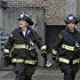Christian Stolte and Miranda Rae Mayo in Chicago Fire (2012)