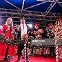 Erik Estrada and Laura McKenzie at an event for 88th Annual Hollywood Christmas Parade (2019)