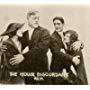 Hazel Buckham, Allan Forrest, Ella Hall, and Robert Z. Leonard in The House Discordant (1914)