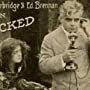 Edward Brennan and Betty Burbridge in Tricked (1915)