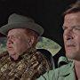 Roger Moore and Clifton James in The Man with the Golden Gun (1974)