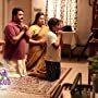 Mohanlal, Meena, Sanoop Santhosh, and Aima Sebastian in Munthirivallikal Thalirkkumbol (2017)