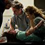 Kyra Sedgwick, Jeffrey Dean Morgan, Matisyahu, and Natasha Calis in The Possession (2012)