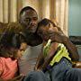 Idris Elba, China Anne McClain, Lauryn Alisa McClain, and Sierra Aylina McClain in Daddy