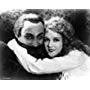 Mary Philbin and Conrad Veidt in The Man Who Laughs (1928)