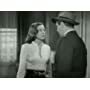 Jim Backus and Ella Raines in A Dangerous Profession (1949)
