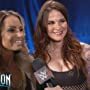 Amy Dumas and Trish Stratus in WWE Evolution (2018)