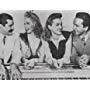 Jerry Colonna, Johnny Johnston, Ann Miller, and Betty Jane Rhodes in Priorities on Parade (1942)