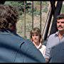 Burt Reynolds, Cynthia Gibb, and Dennis Burkley in Malone (1987)