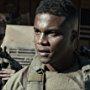 Cory Hardrict and Luke Grimes in American Sniper (2014)