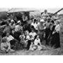 Gloria Grahame, Roy Webb, James Bell, Jeff Corey, Myrna Dell, Jeff Donnell, Martha Hyer, John Ireland, Claude Jarman Jr., Mark Robson, Steve Savage, Robert Sterling, and Peter Viertel in Roughshod (1949)