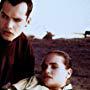 Billy Zane and Kristen Cloke in Megaville (1990)