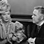 John Hamilton and Miriam Hopkins in Lady with Red Hair (1940)