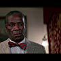 Moses Gunn in Firestarter (1984)