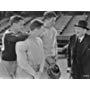 James Stewart, Lionel Barrymore, Robert Young, and Tom Brown in Navy Blue and Gold (1937)