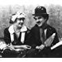 Charles Chaplin and Edna Purviance in Work (1915)