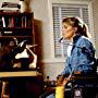 Kate McNeil and Boo in Monkey Shines (1988)