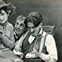 James T. Kelley, Harold Lloyd, and Gene Marsh in Pete, the Pedal Polisher (1915)