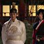 Jae-rim Song and Soo-hyun Kim in The Moon That Embraces the Sun (2012)